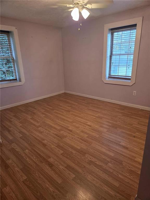 255 Francis Mine State Road Burgettstown, PA 15021 - Photo 30 of 33 an empty room with wooden floor and windows