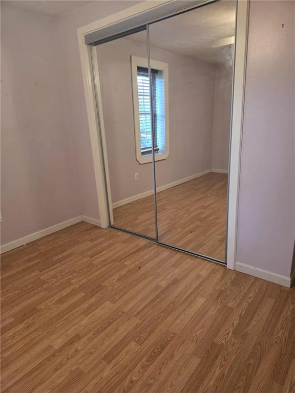 255 Francis Mine State Road Burgettstown, PA 15021 - Photo 31 of 33 an empty room with wooden floor and windows