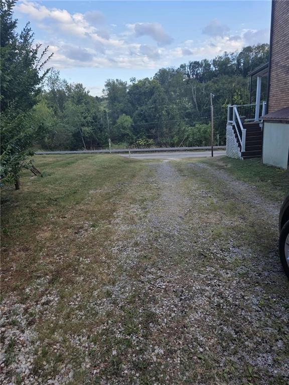255 Francis Mine State Road Burgettstown, PA 15021 - Photo 5 of 33 a view of outdoor space with green field and trees