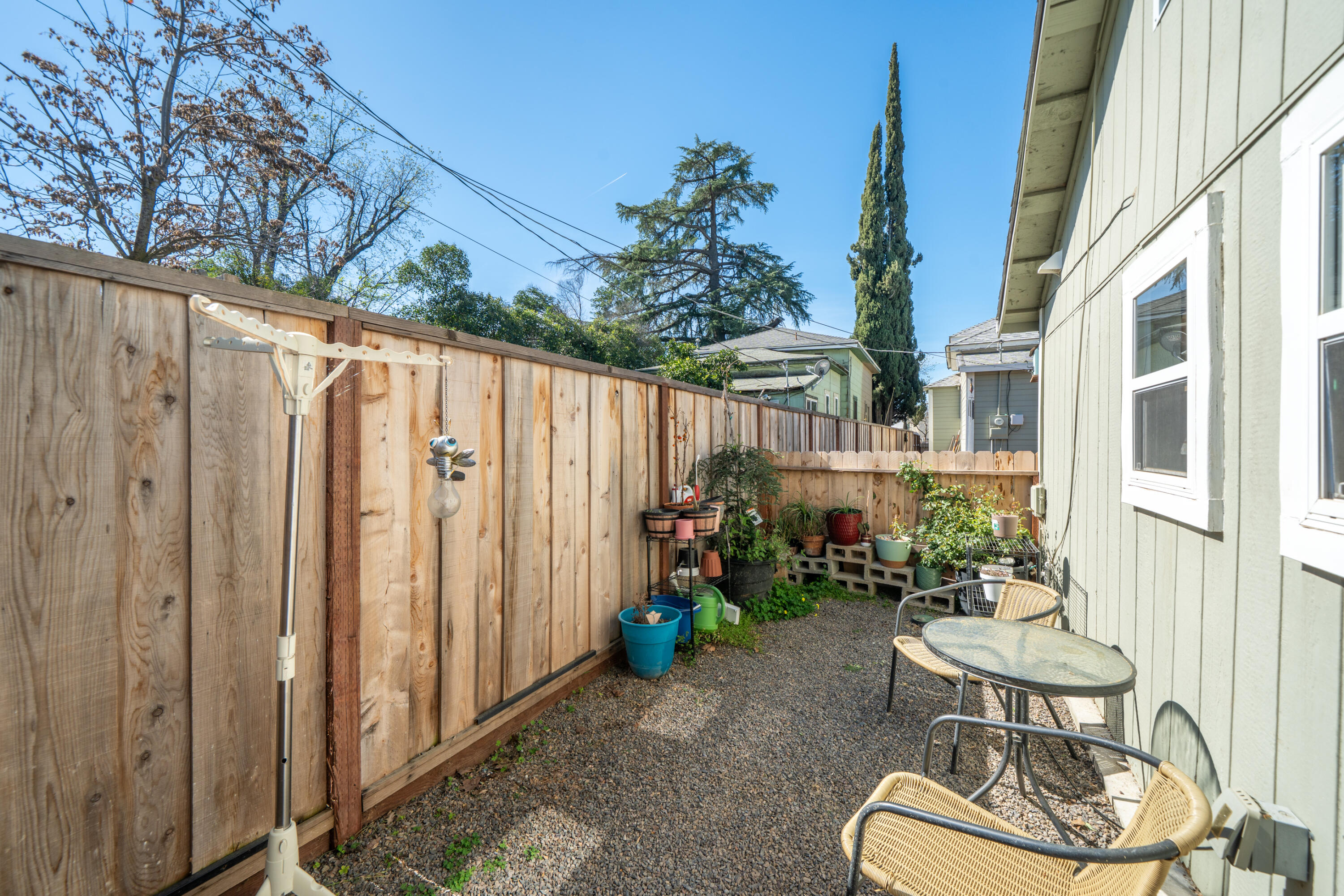 1158 Madison Street Red Bluff, CA 96080 - Photo 26 of 36 a view of a chair and table in backyard