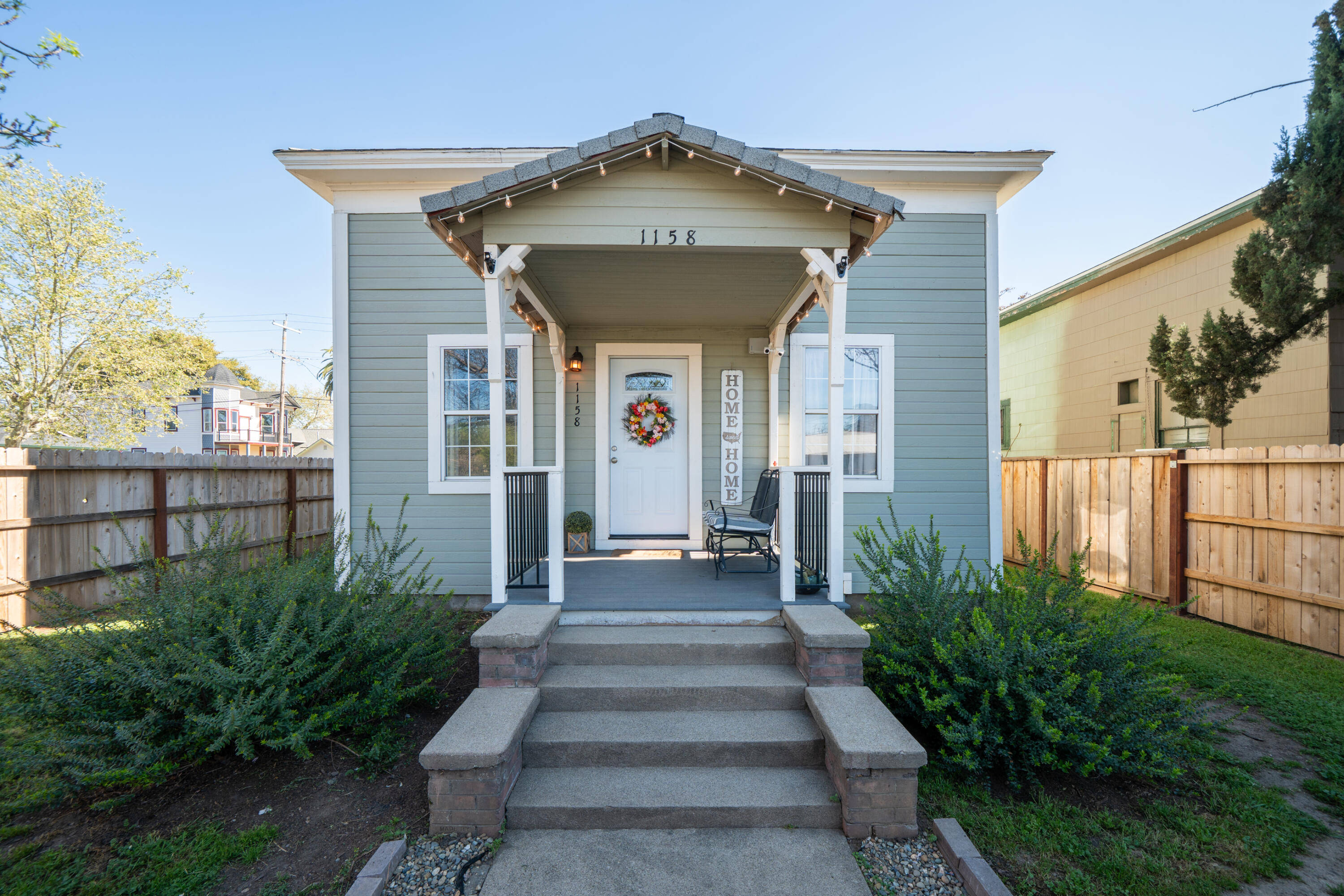 1158 Madison Street Red Bluff, CA 96080 - Photo 28 of 36 a front view of a house with a yard