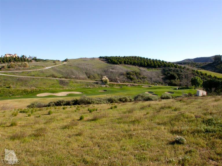 321 Fresh Meadows Road Simi Valley, CA 93065 - Photo 22 of 23 a view of a town with mountains in the background