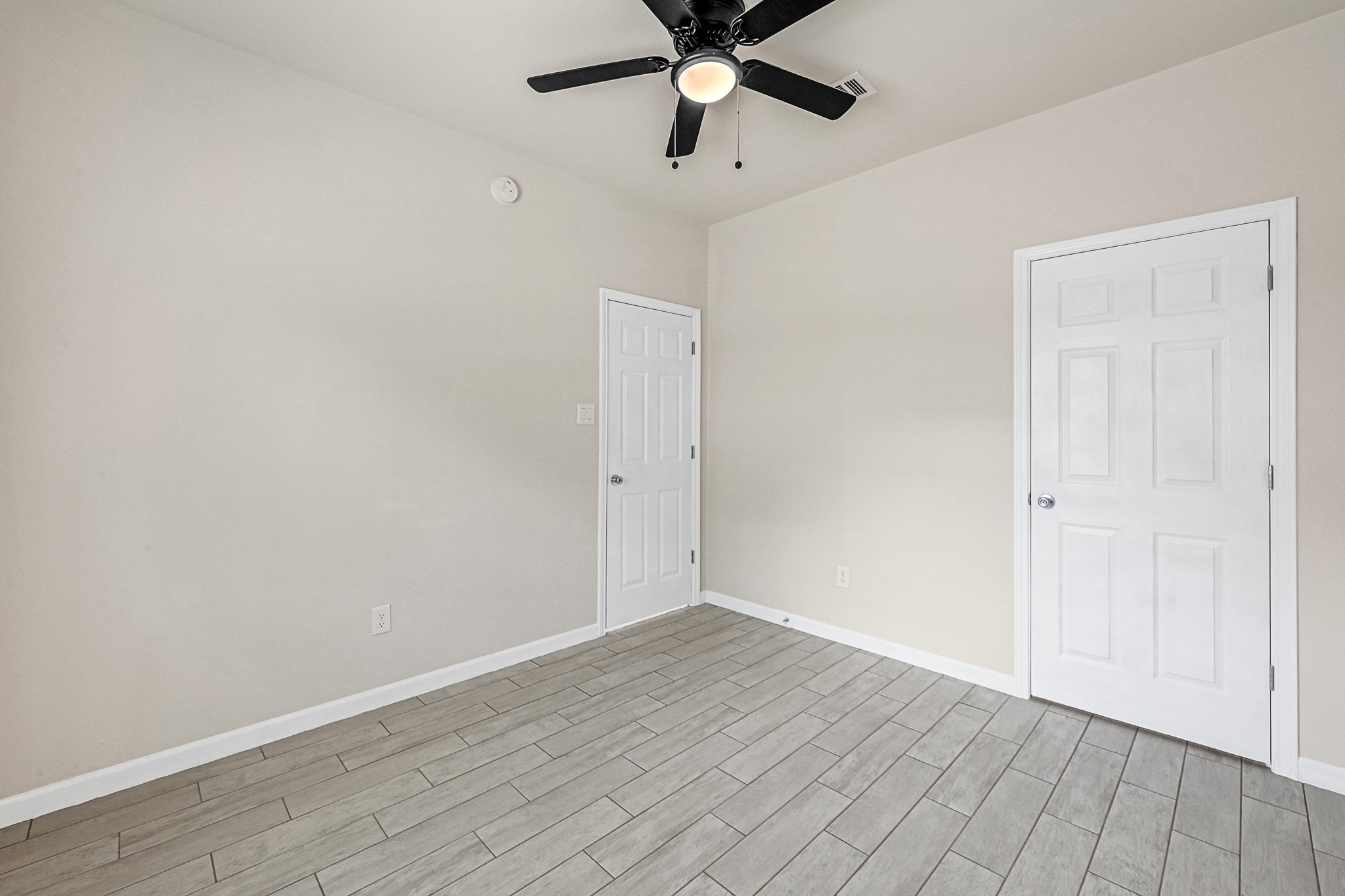 20603 Marilyn Lane, Unit B Spring, TX 77388 - Photo 15 of 18 a view of an empty room with wooden floor