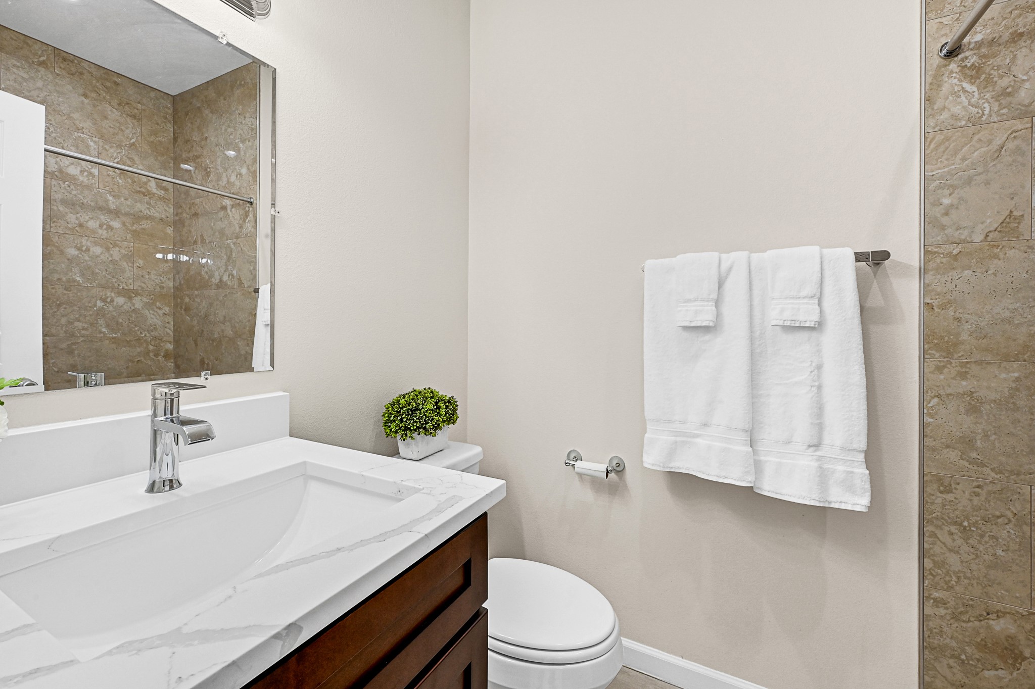 20603 Marilyn Lane, Unit B Spring, TX 77388 - Photo 16 of 18 a bathroom with a sink toilet and shower