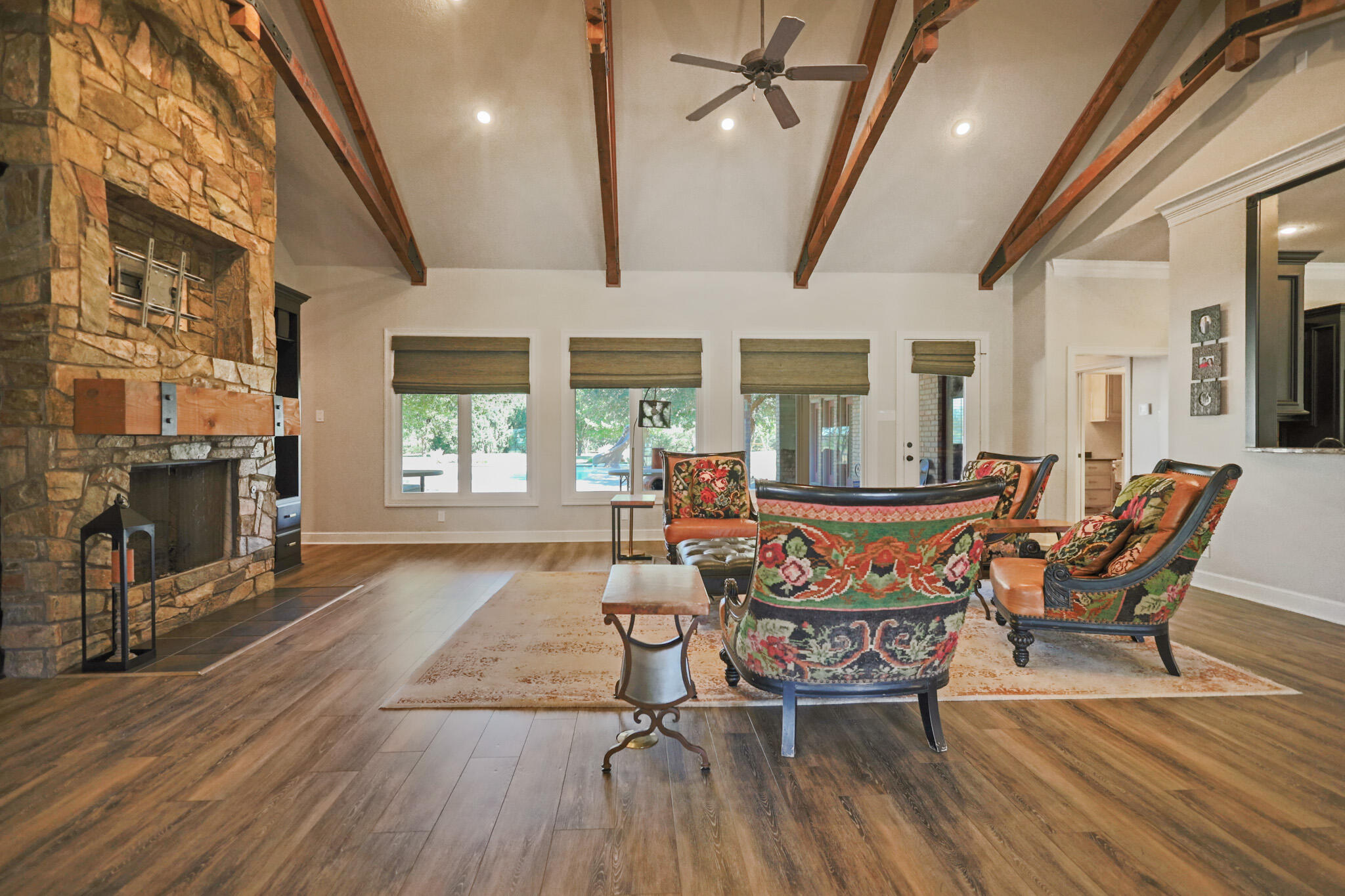 7002 50th Street Lubbock, TX 79407 - Photo 16 of 81 a view of a dining room with furniture window and wooden floor
