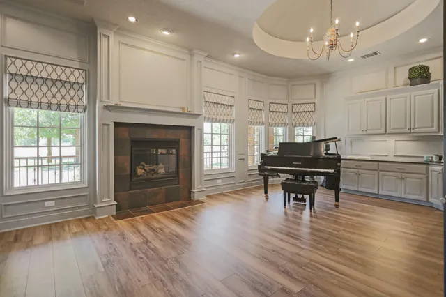 a kitchen with stainless steel appliances kitchen island granite countertop a sink and cabinets