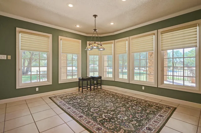 a bedroom with a bed and a cabinets