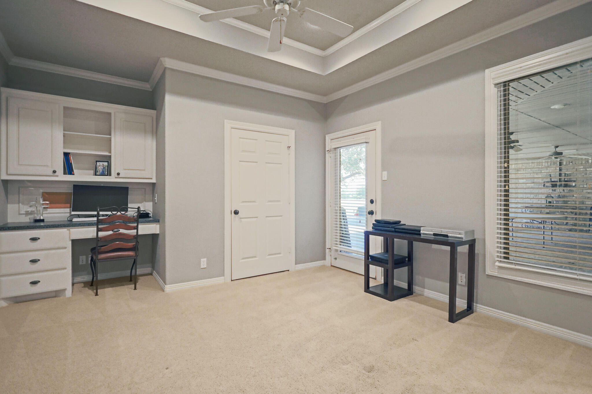 7002 50th Street Lubbock, TX 79407 - Photo 37 of 81 a view of workspace with furniture and window