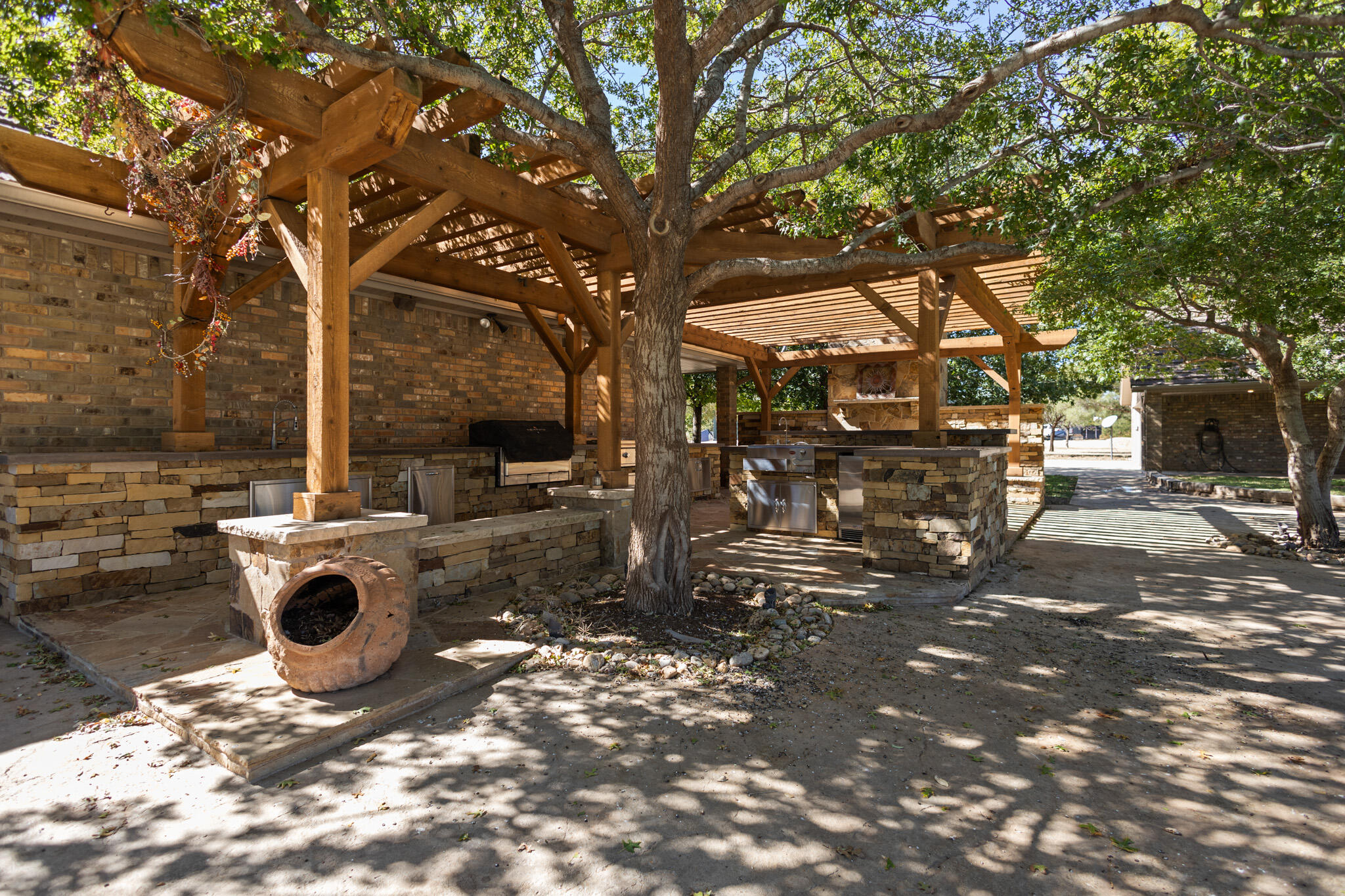 7002 50th Street Lubbock, TX 79407 - Photo 47 of 81 a view of outdoor space with deck and garden