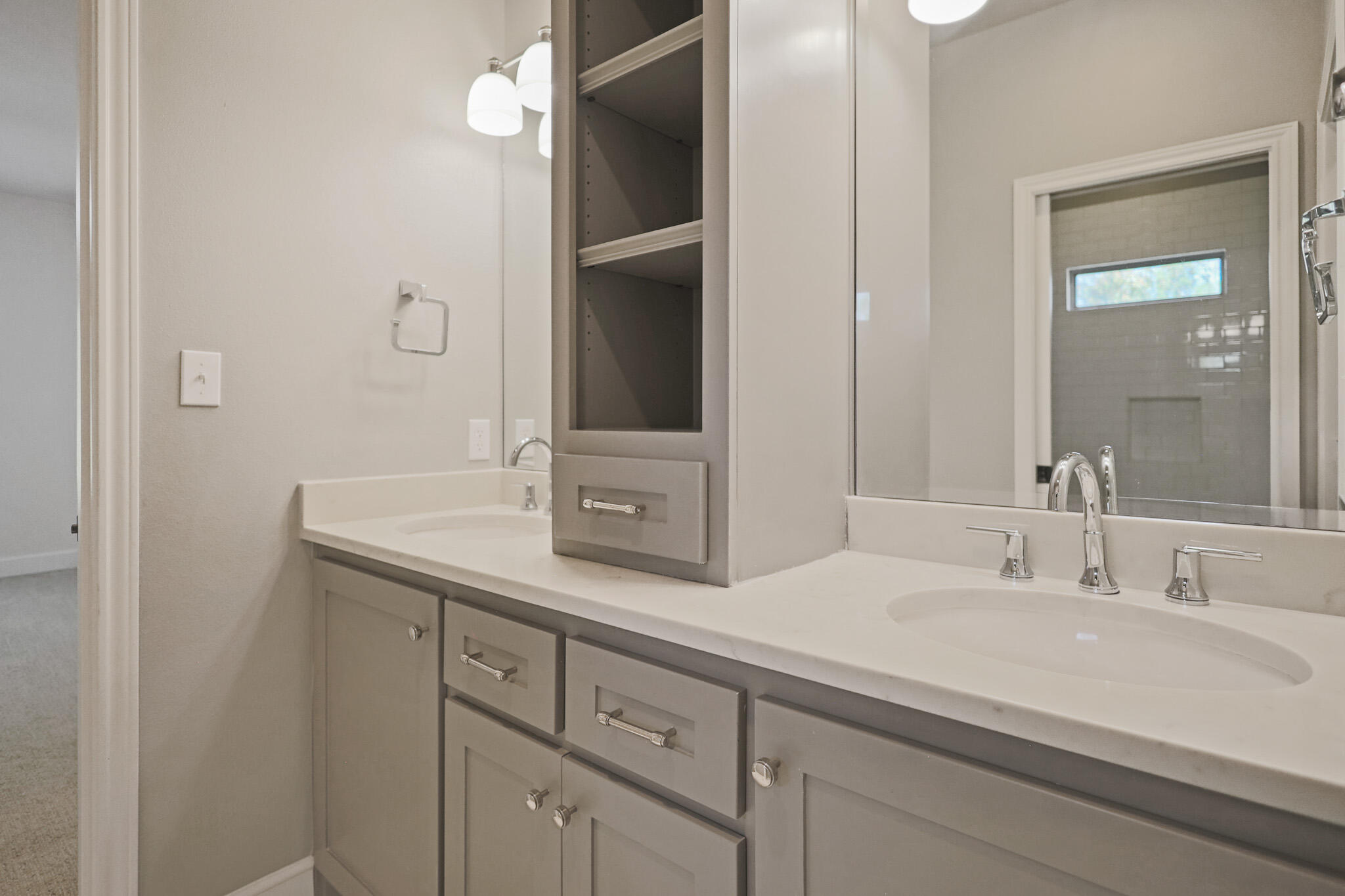 7002 50th Street Lubbock, TX 79407 - Photo 67 of 81 a bathroom with a sink and a mirror