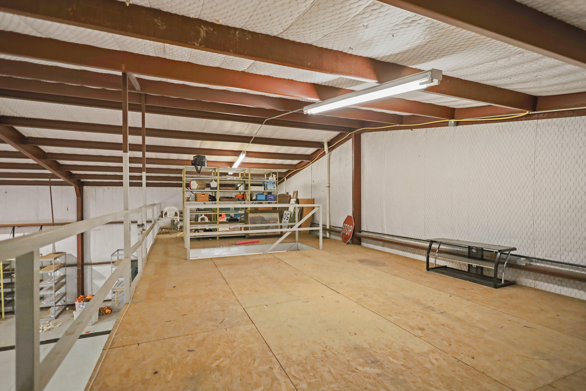 7002 50th Street Lubbock, TX 79407 - Photo 77 of 81 a view of an empty room with wooden floor