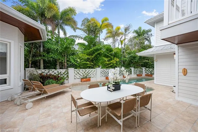 a view of a building with sitting area