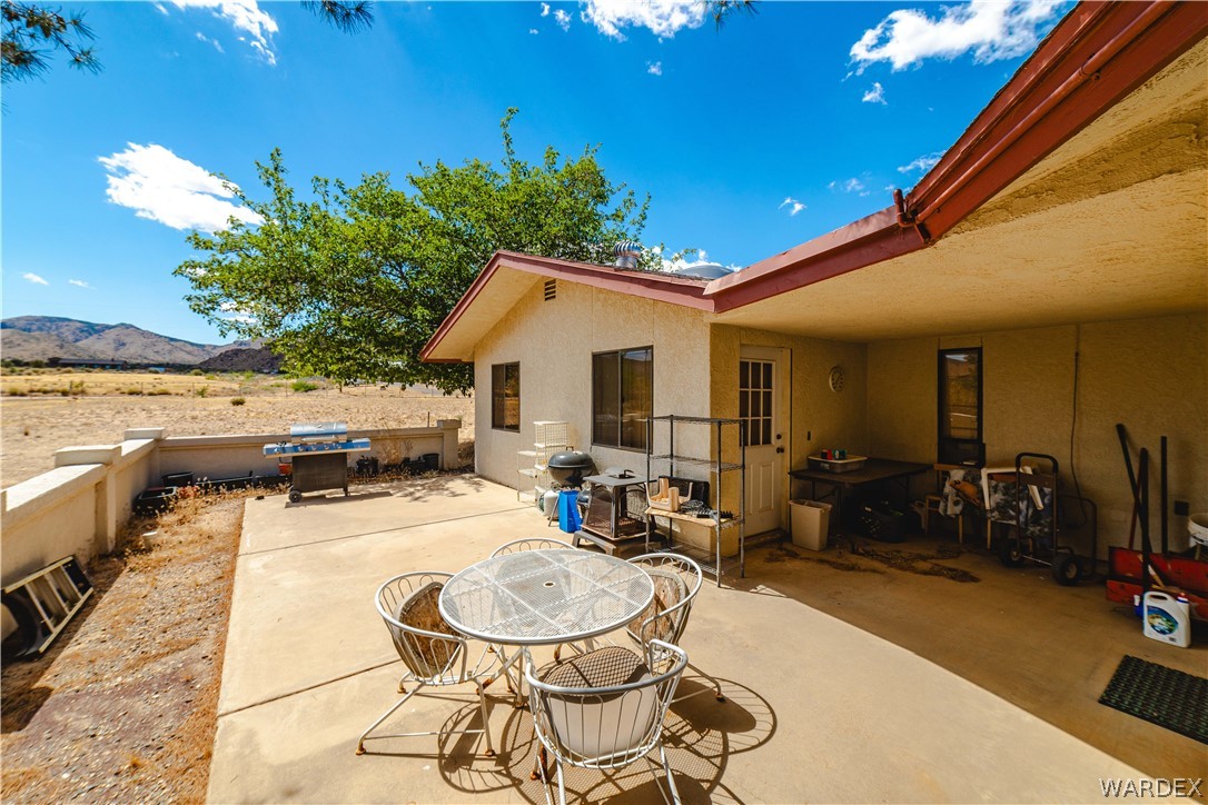 2100 East Valley View Road Kingman, AZ 86409 - Photo 37 of 53 Expansive concrete patio offering a covered area with recessed lighting and an uncovered section