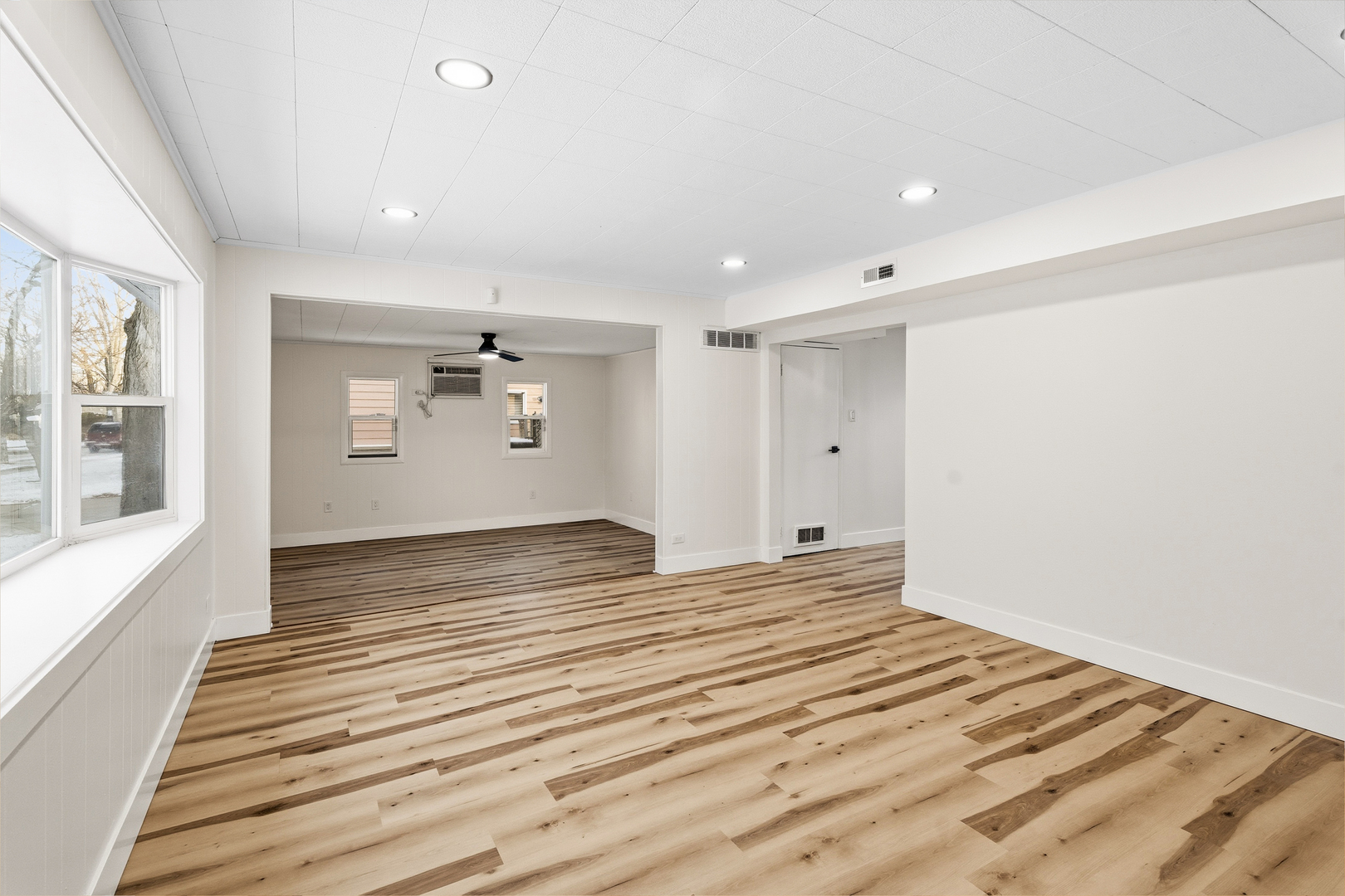 409 Winnemac Street Park Forest, IL 60466 - Photo 19 of 21 a view of a room with wooden floor and window