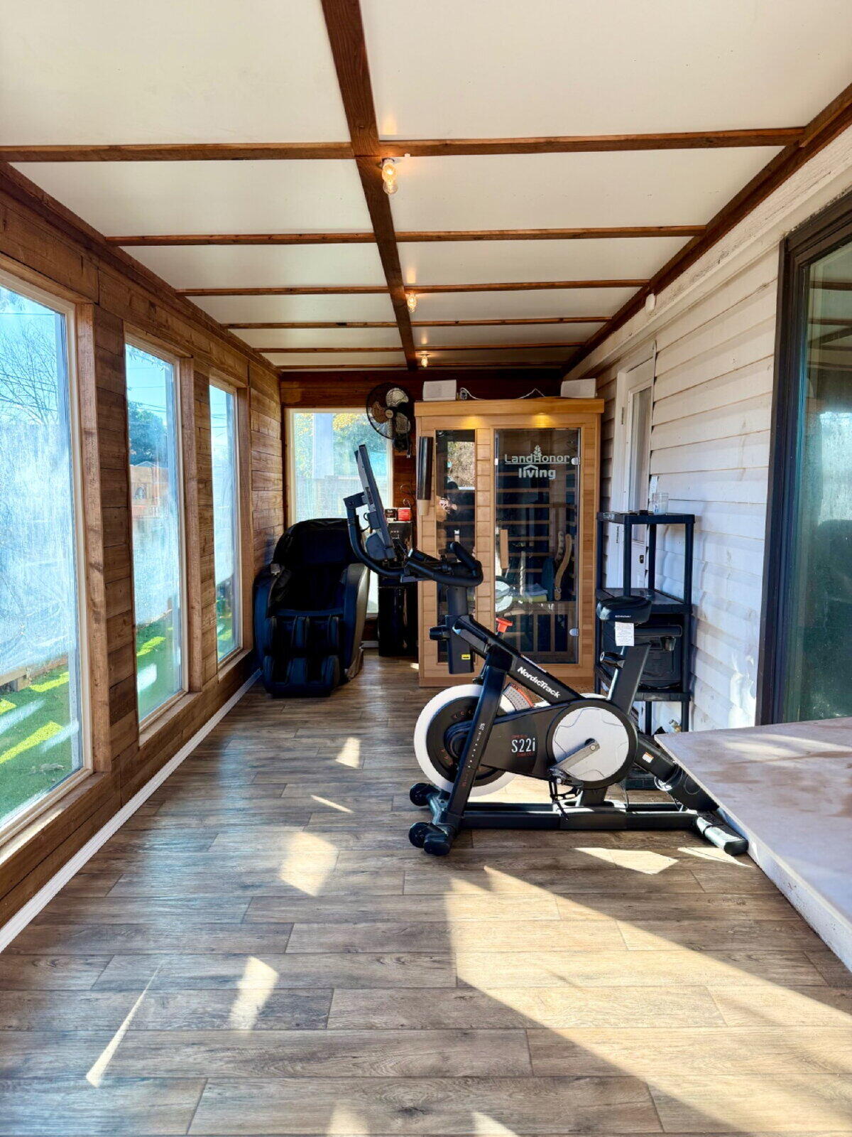 3001 32nd Street Lubbock, TX 79410 - Photo 22 of 35 a room with gym equipment and a large window