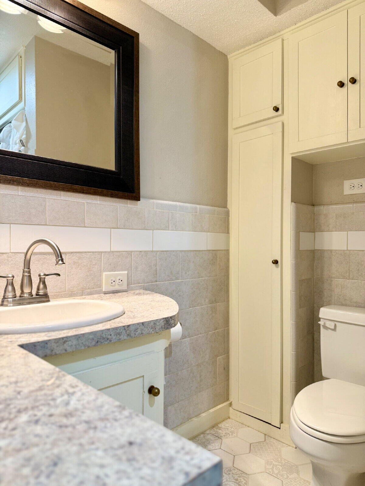 3001 32nd Street Lubbock, TX 79410 - Photo 30 of 35 a bathroom with a sink and a toilet