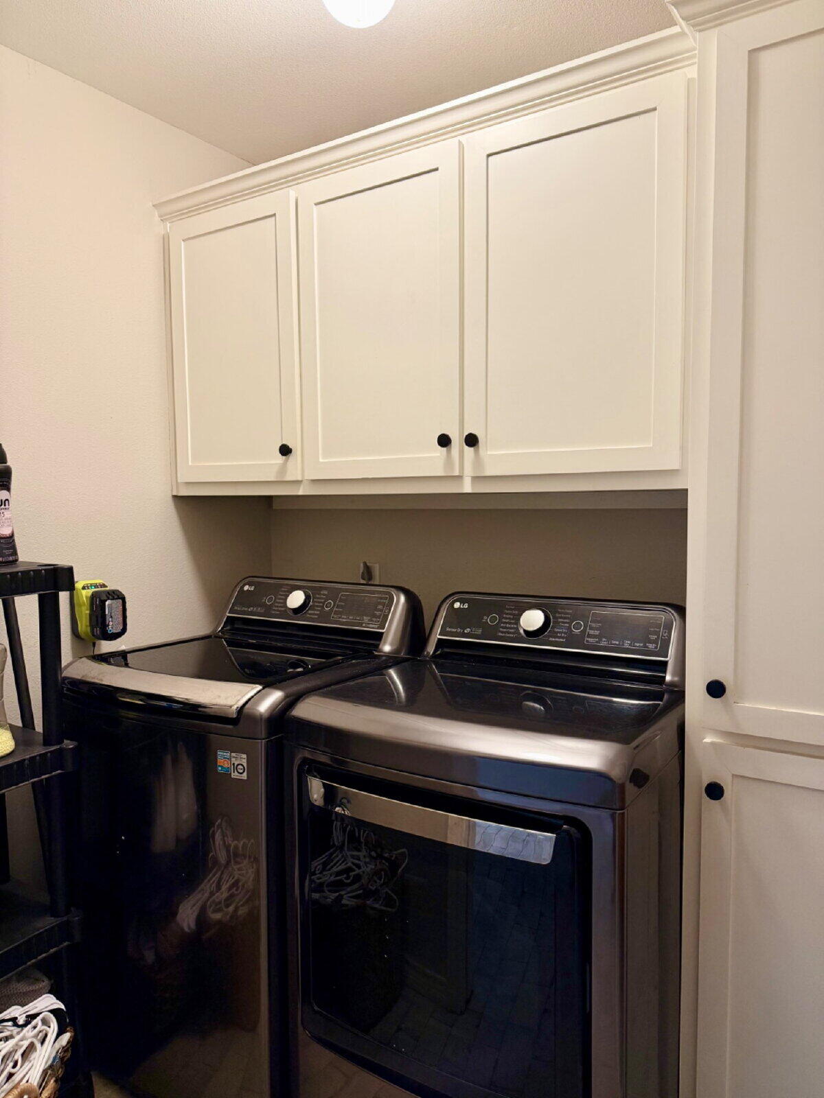 3001 32nd Street Lubbock, TX 79410 - Photo 31 of 35 a kitchen with stainless steel appliances granite countertop white cabinets and a stove