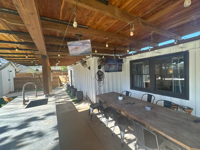 a outdoor space with lots of table and chairs