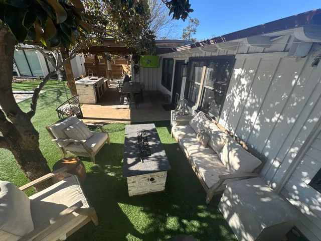 a view of yard from a corridor