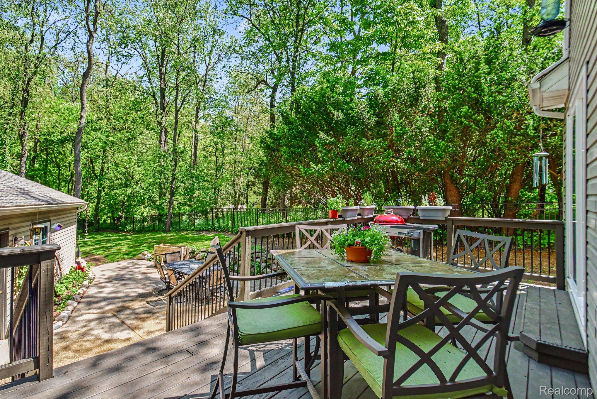 9790 Norman Road Clarkston, MI 48348 - Photo 22 of 25 Freshly painted deck & fully fenced yard