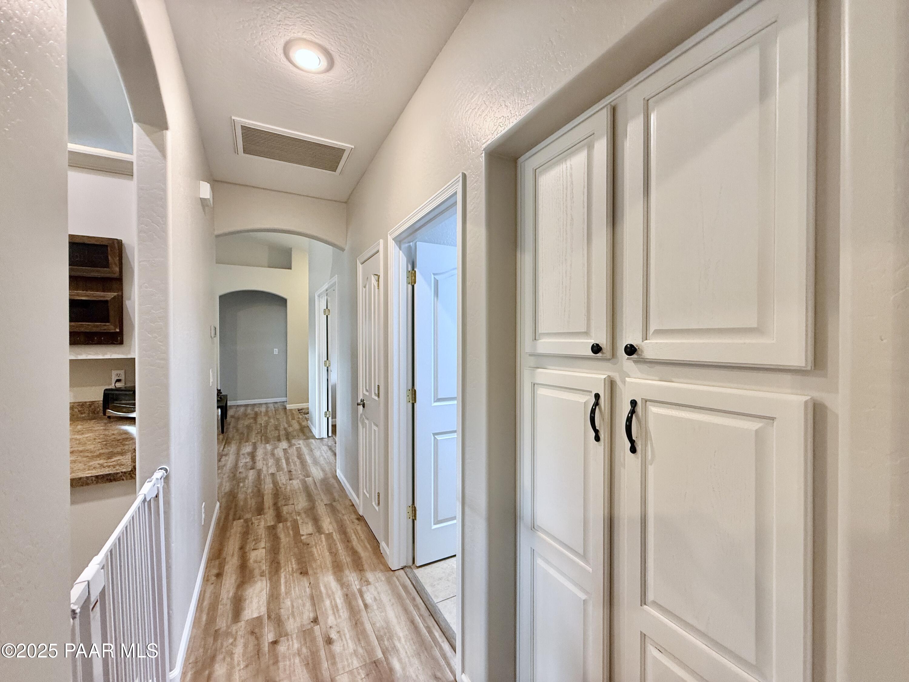 6622 Farmstead Road Prescott Valley, AZ 86314 - Photo 34 of 52 31 Hallway from Master to Great Room
