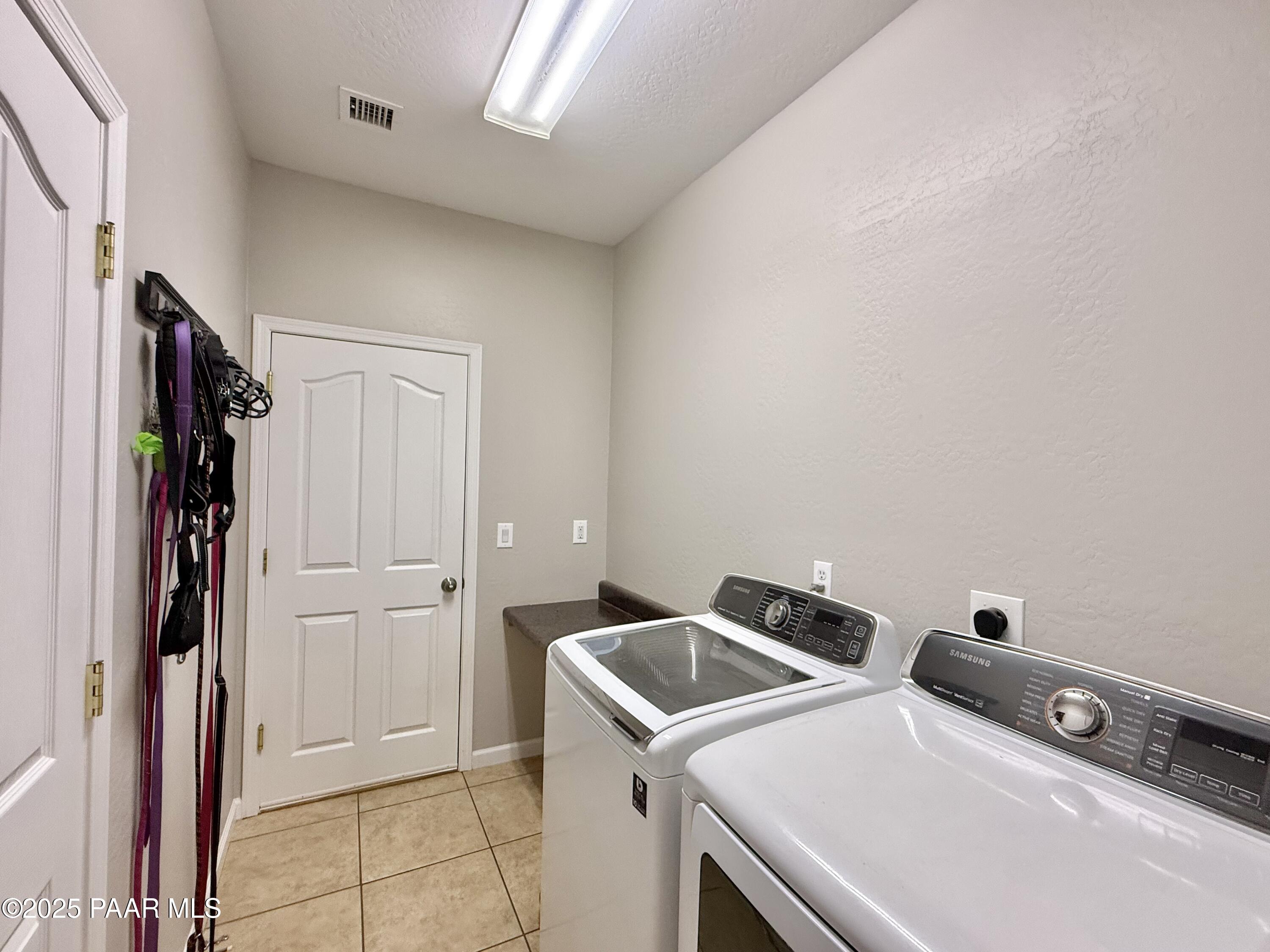 6622 Farmstead Road Prescott Valley, AZ 86314 - Photo 40 of 52 37 Laundry & Garage Entry