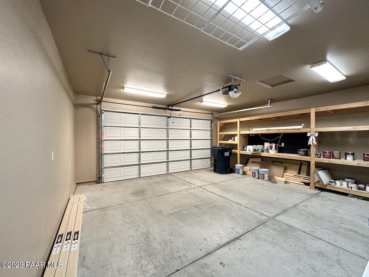6622 Farmstead Road Prescott Valley, AZ 86314 - Photo 51 of 52 49 Garage - Shelving