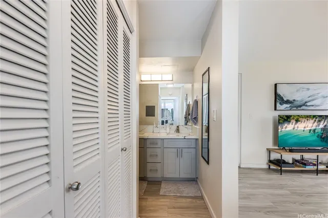 a view of a living room kitchen and a window