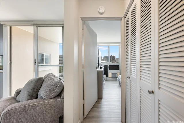 a living room with furniture and a gate