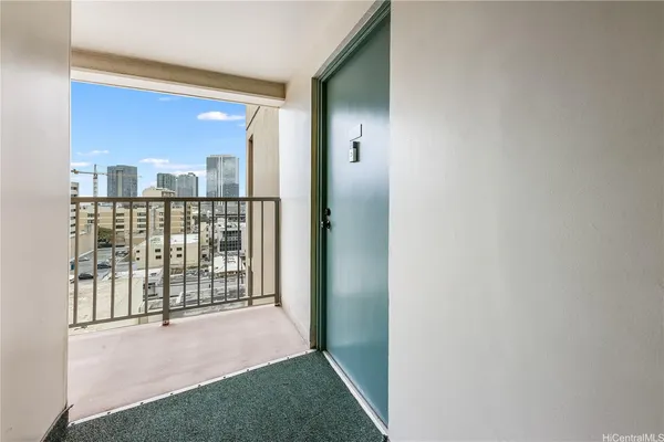 a view of balcony with furniture