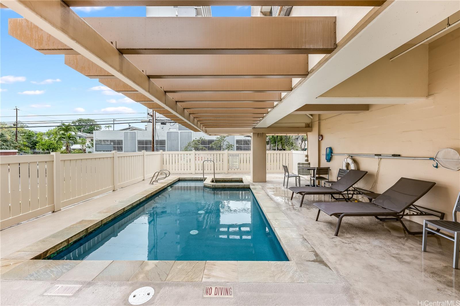 785 Kinau Street, Unit PH4 Honolulu, HI 96813 - Photo 19 of 23 a living room with a couch and chairs