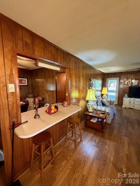 20415 Efird Road Albemarle, NC 28001 - Photo 5 of 16 a kitchen with a sink dishwasher and a dining table with wooden floor