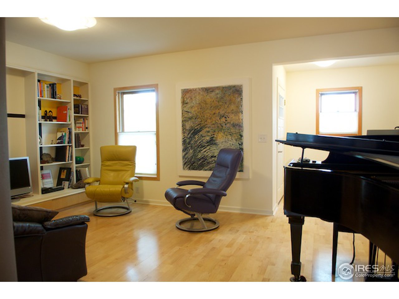 644 Dewey Avenue Boulder, CO 80304 - Photo 3 of 14 a living room with furniture and large window