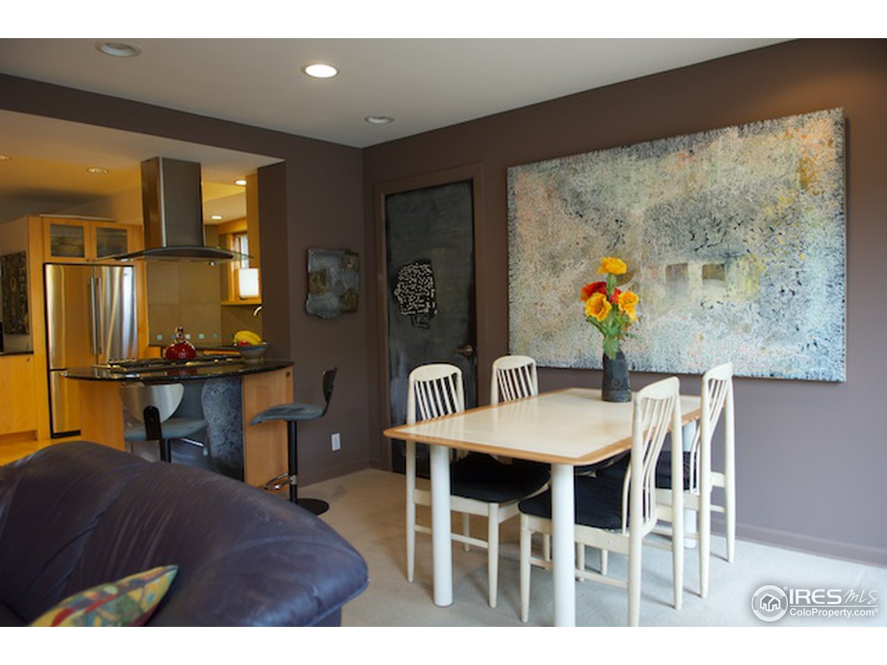 644 Dewey Avenue Boulder, CO 80304 - Photo 10 of 14 a view of a dining room with furniture and wooden floor