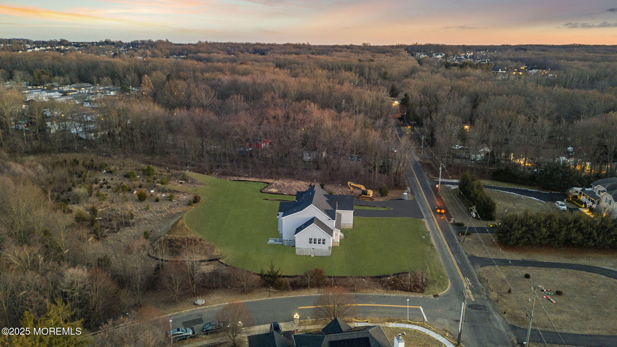 129 Crine Road Morganville, NJ 07751 - Photo 6 of 23 an aerial view of a house with a garden