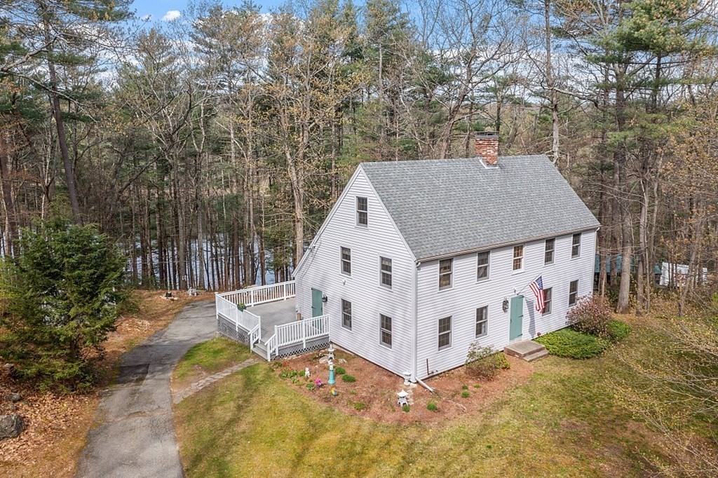 149 Walker Pond Road Sturbridge, MA 01566 - Photo 1 of 42 a view of a house with a yard