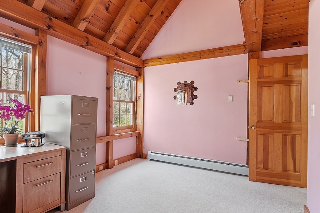 149 Walker Pond Road Sturbridge, MA 01566 - Photo 17 of 42 a view of a refrigerator in kitchen and a window