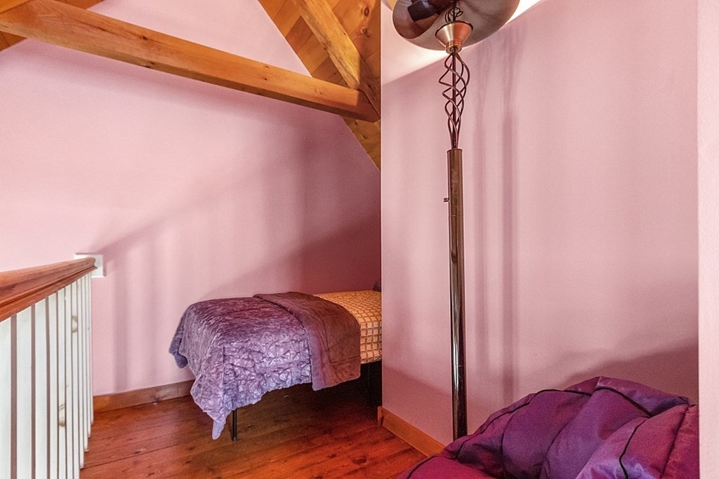 149 Walker Pond Road Sturbridge, MA 01566 - Photo 18 of 42 a bedroom with a bed and a closet