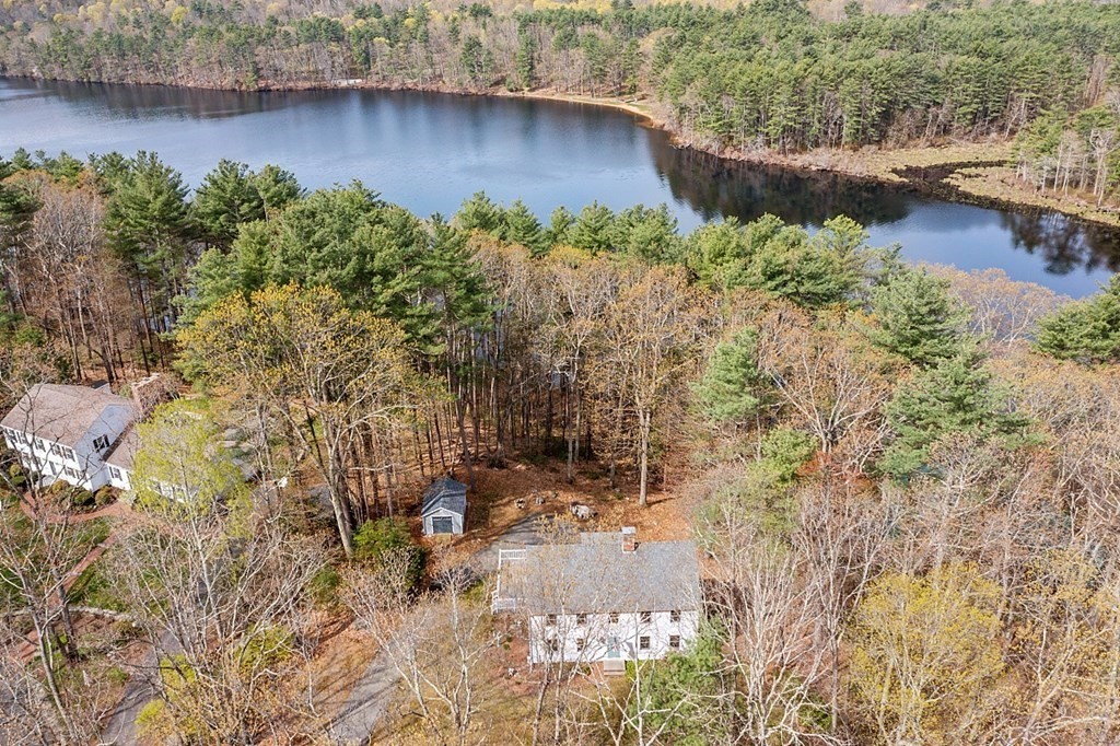 149 Walker Pond Road Sturbridge, MA 01566 - Photo 2 of 42 a view of a lake with large trees