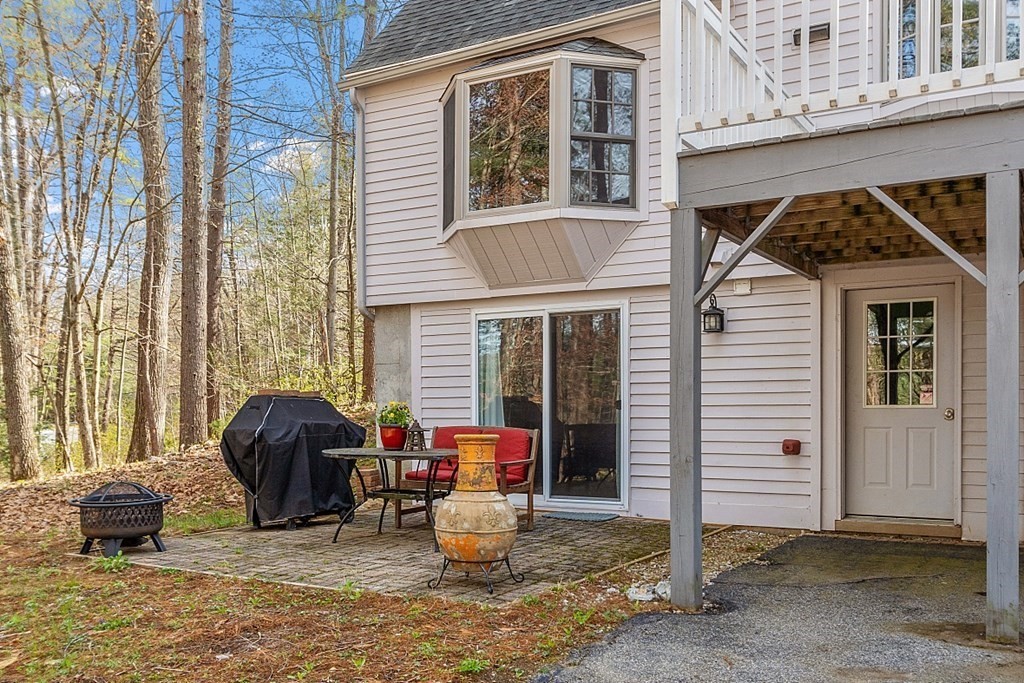 149 Walker Pond Road Sturbridge, MA 01566 - Photo 32 of 42 a front view of a house with patio