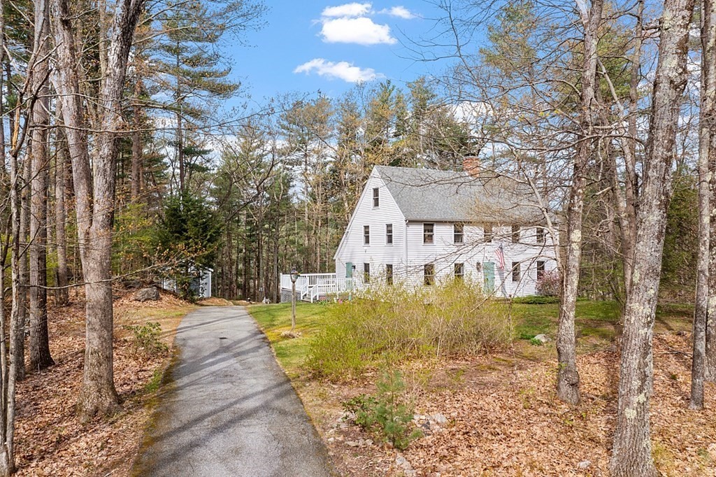 149 Walker Pond Road Sturbridge, MA 01566 - Photo 36 of 42 a view of a house with a yard