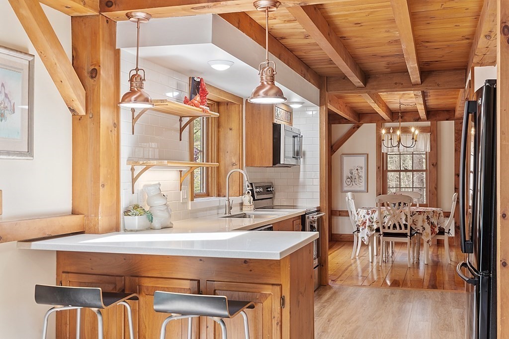 149 Walker Pond Road Sturbridge, MA 01566 - Photo 5 of 42 a bathroom with a sink and a mirror