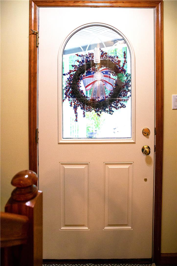 50 Anthony's Road White Haven, PA 18661 - Photo 12 of 57 Welcome guests with a classic arched glass entry door, framing the home's inviting interior.