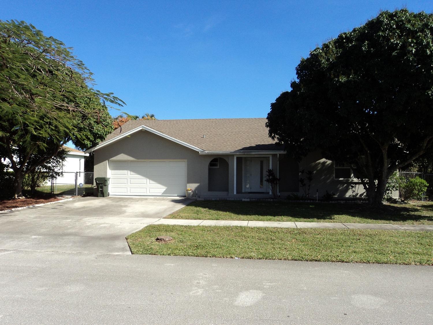 1306 Northwest 2nd Circle Boca Raton, FL 33432 - Photo 1 of 38 Front