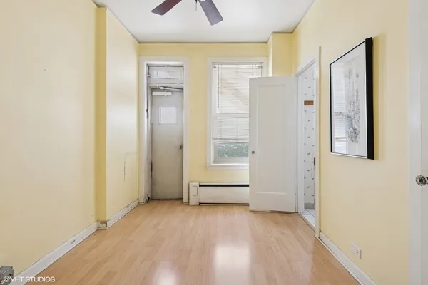 a view of an empty room with a window