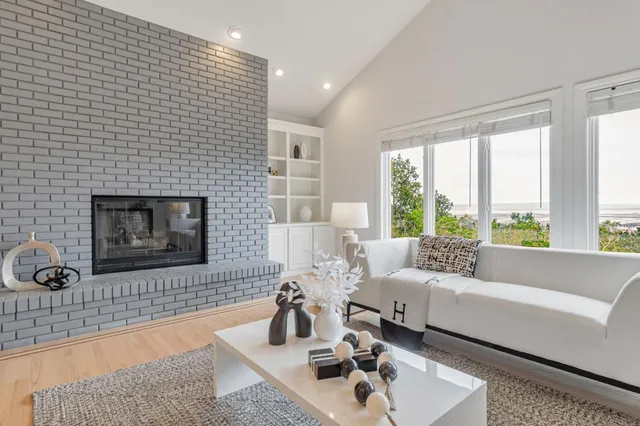a view of a dining room with furniture wooden floor and chandelier