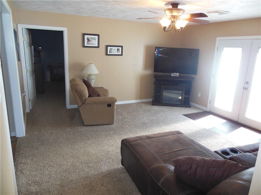 119 Spiker Road Cabot, PA 16023 - Photo 14 of 25 Living Room - Double Doors lead to the back patio