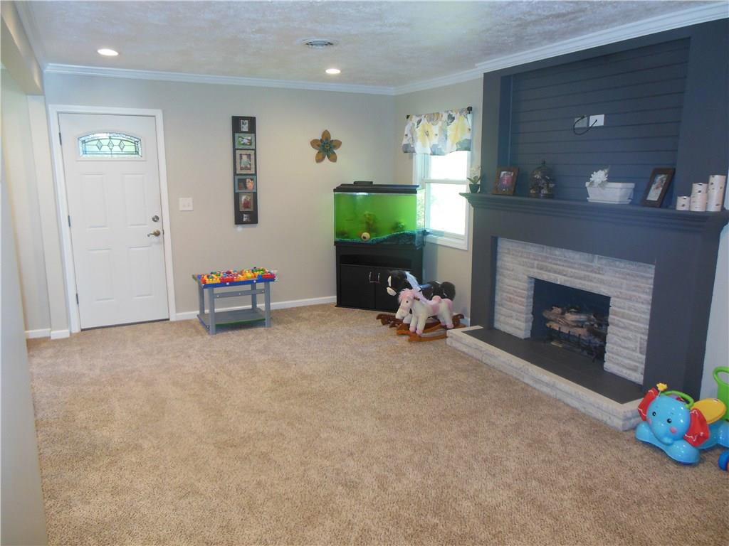 119 Spiker Road Cabot, PA 16023 - Photo 18 of 25 Front door leads to the enclosed porch area