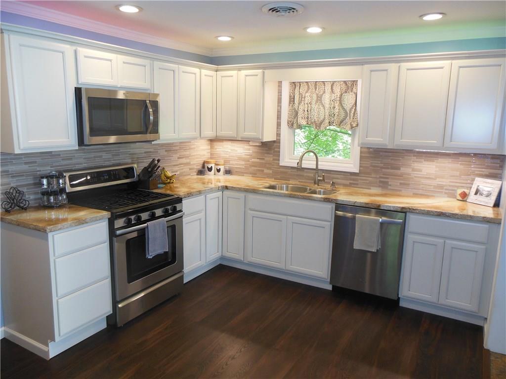 119 Spiker Road Cabot, PA 16023 - Photo 9 of 25 Stunning kitchen with unique lighting above and lighting under the cabinets