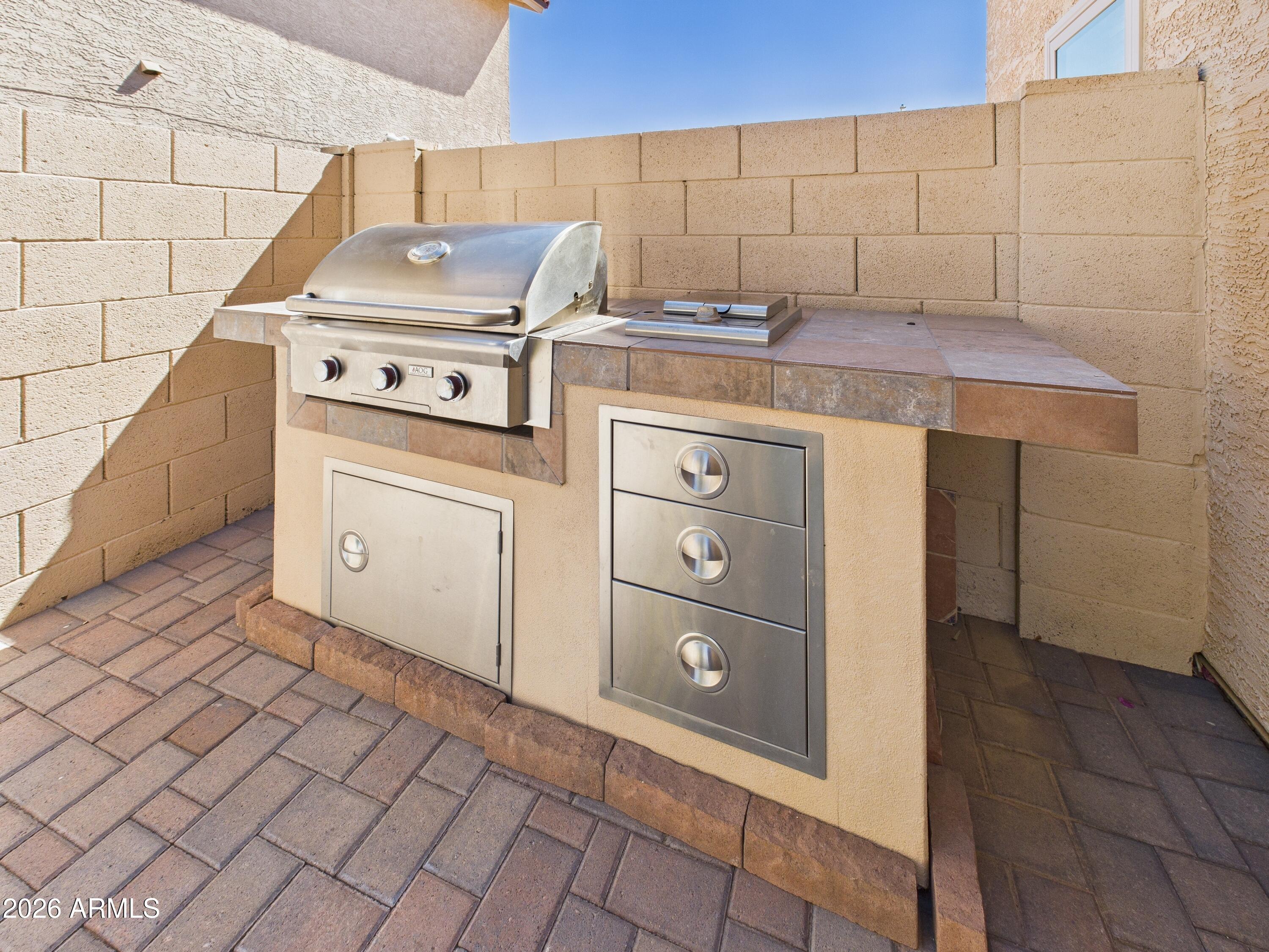 2750 East Rock Wren Road Phoenix, AZ 85048 - Photo 18 of 90 a kitchen with cabinets and appliances